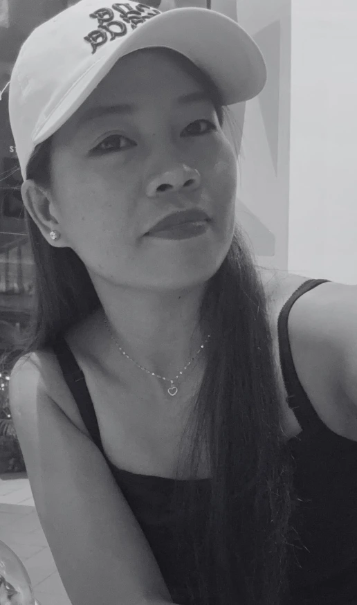 Queen Sierra wearing a cap, professional dominatrix in Manila